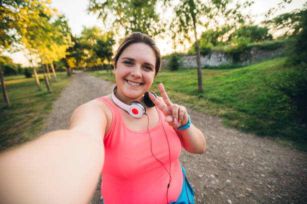 istock Oversized woman selfie at running 1192844733