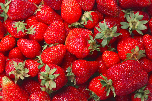 istock Strawberry. Fresh berries macro. Fruit background. Top view. 1192844983