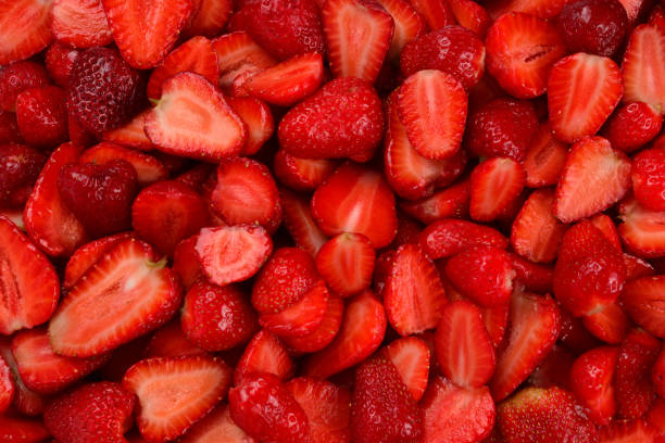 istock Strawberry slices. Fresh berries macro. Fruit background. Top view. 1192845513