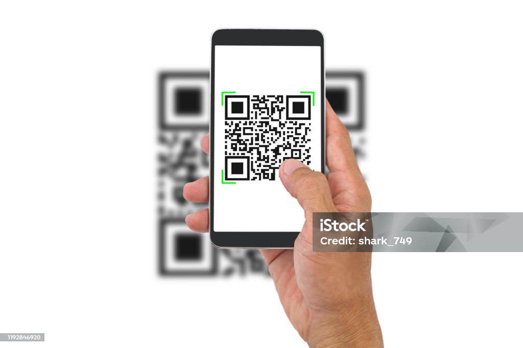 Hand holding smartphone scanning QR code on white background, business concept QR Code Stock Photo
