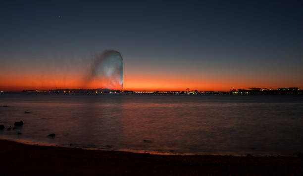 Panoramic view of the King Fahd's Fountain, the world's tallest fountain, seen from the South Corniche, Jeddah, Saudi Arabia, with a beautiful sunset in the background December 8th 2019, Jeddah Saudi Arabia. The world's tallest water fountain is seen from all over the south corniche, the promenade of Jeddah. saudi arabia jeddah landscape stock pictures, royalty-free photos & images