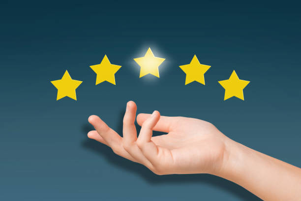 istock Hand of a client determining the rating of services according to a five-point system 1192850797