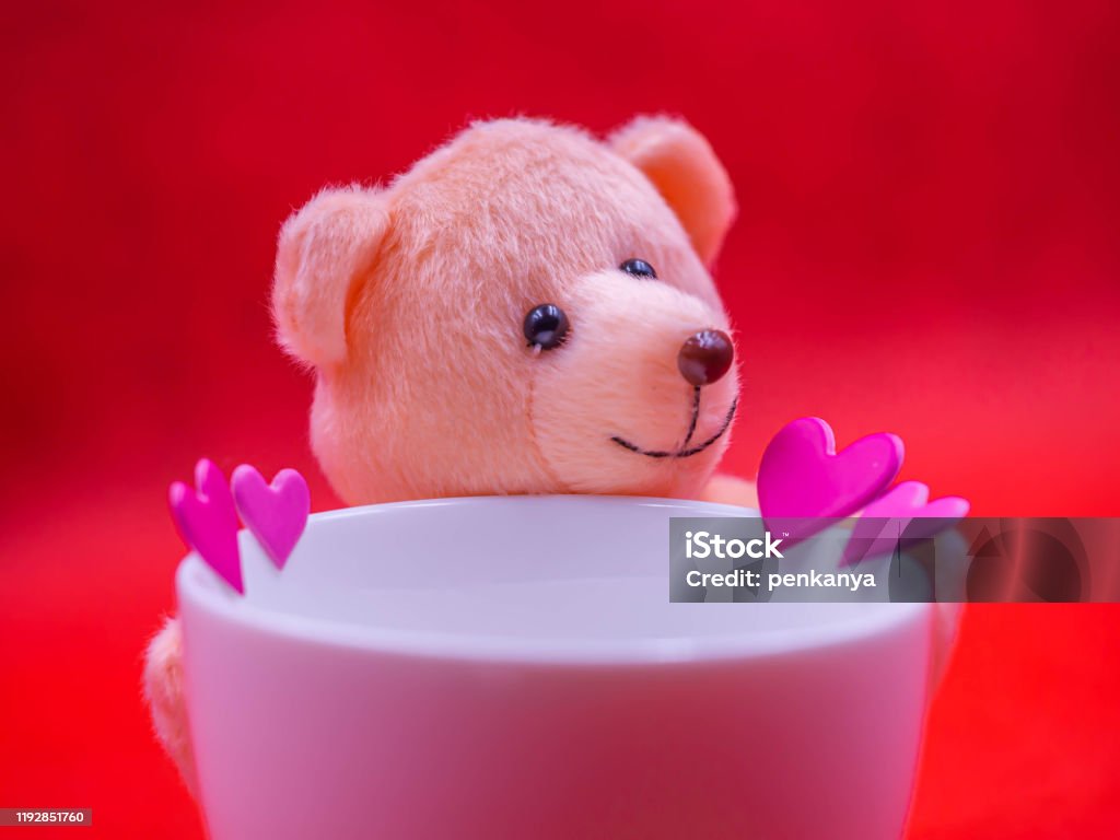 Closeup Of Smiling Teddy Bear Doll With Pink Heart Shape Sticker ...