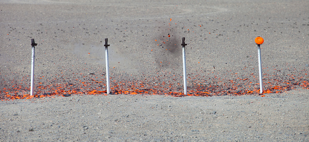 Clay Bird Exploding After Being Hit With A Shotgun Blast Stock Photo ...