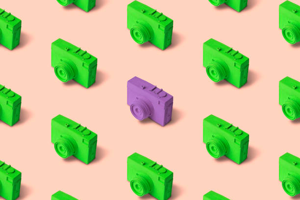 istock Light green and purple vintage film photo camera modern pattern. Think different concept. 1192851976