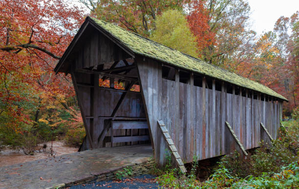 istock Pisgah covered bridge in fall in North Carolina 1192852086