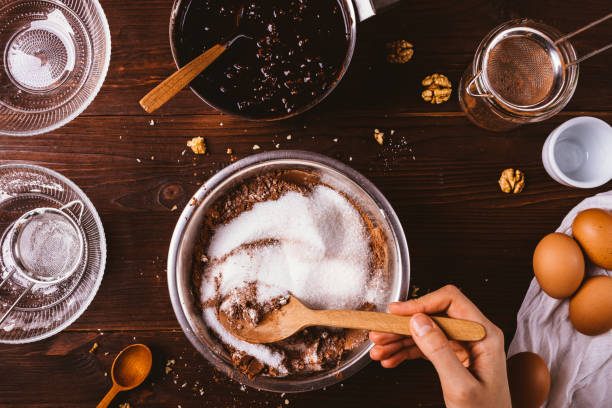 istock Woman's hands mix cocoa powder 1192853960