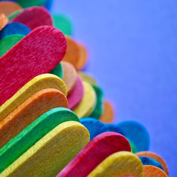 istock wooden colorful sticks decoration, multi colored background 1192854713