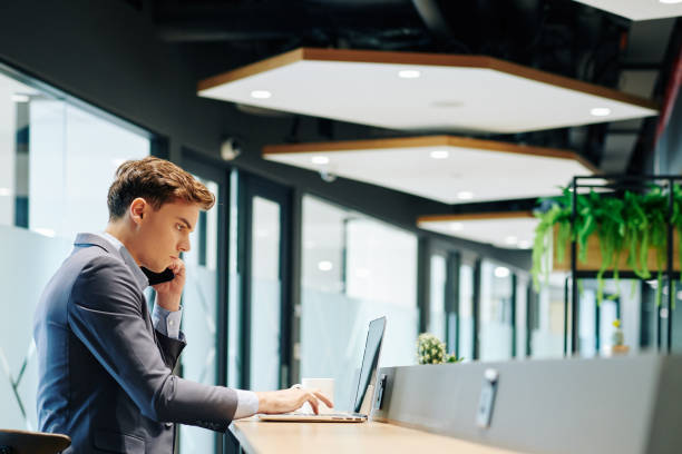 istock Entrepreneur checking report on laptop 1192856879