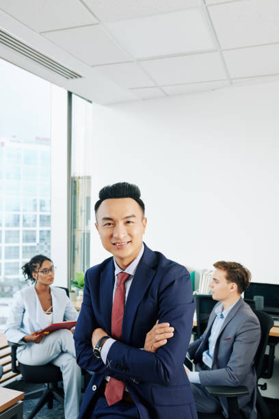 istock Happy businessman in modern office 1192858544