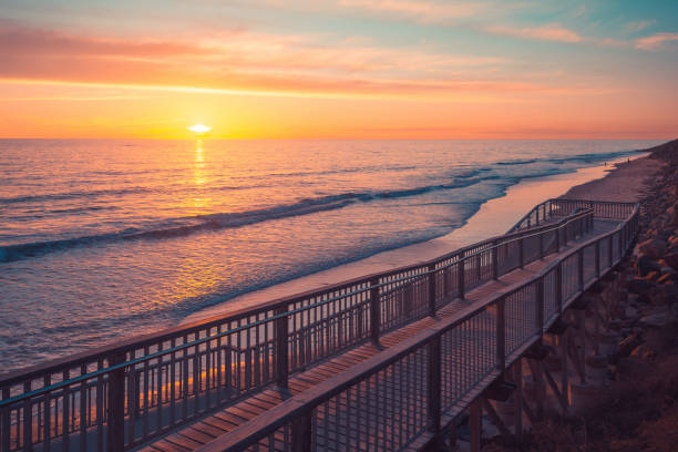 istock Christies Beach boardwalk at pink sunset 1192861152