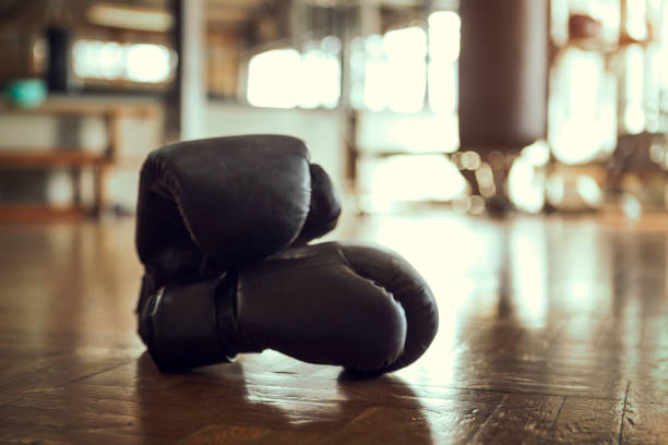 istock Boxing Gloves in gym 1192861407
