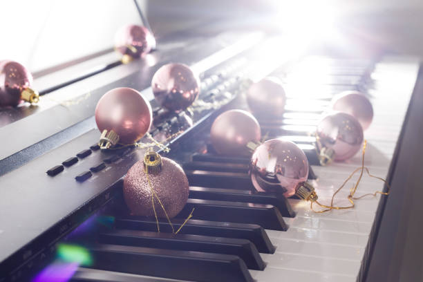 istock Piano keyboard with Christmas decoration, closeup 1192861661