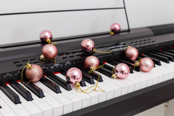 istock Piano keyboard with Christmas decoration, closeup 1192862209