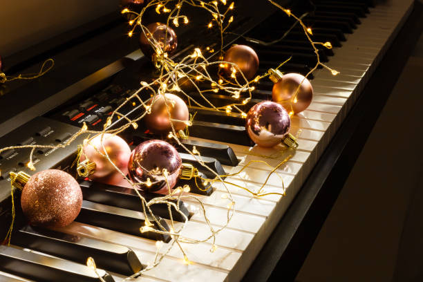 istock A piano with christmas lights and tree 1192862260