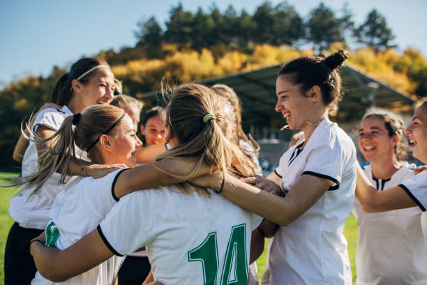 istock Female soccer team celebrating victory 1192862476