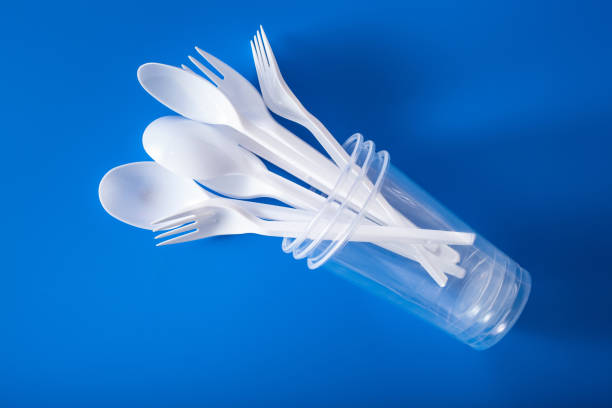istock single use plastic cups, forks, spoons. concept of recycling plastic, plastic waste 1192864198