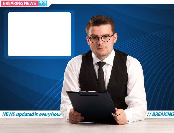 istock Television reporter telling breaking news at his studio desk with copy space 1192866255