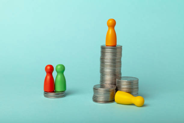 istock Poor married couple and lonely sad rich man 1192866828