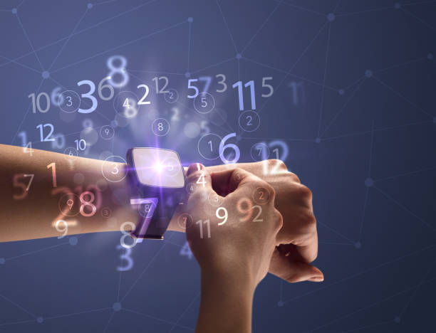 istock Close up hand with smartwatch and numbers 1192868069