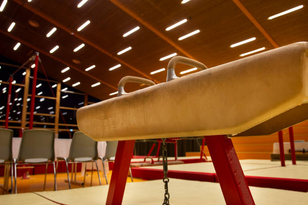 Exercising on pommel horse.