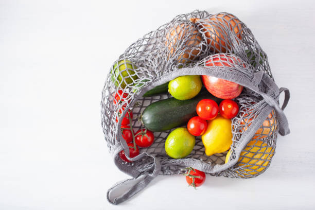 istock fruits vegetables in reusable mesh cotton bag, plastic free zero waste concept 1192868342