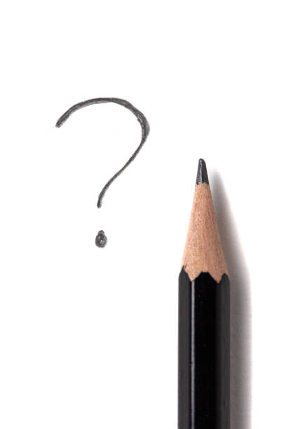black pencil and question mark on a white sheet of paper