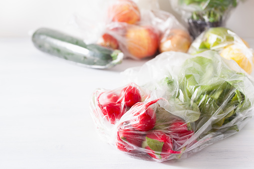 Single Use Plastic Waste Issue Fruits And Vegetables In Plastic Bags Stock  Photo - Download Image Now - iStock