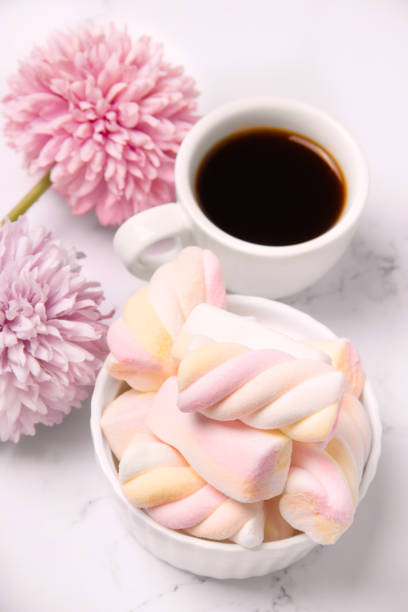istock breakfast of coffee and marshmallows on a white background 1192873546