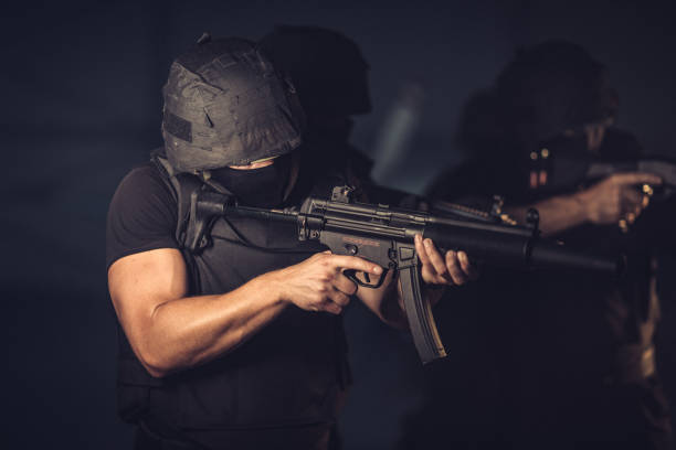 istock Special forces team with guns on a mission 1192874055