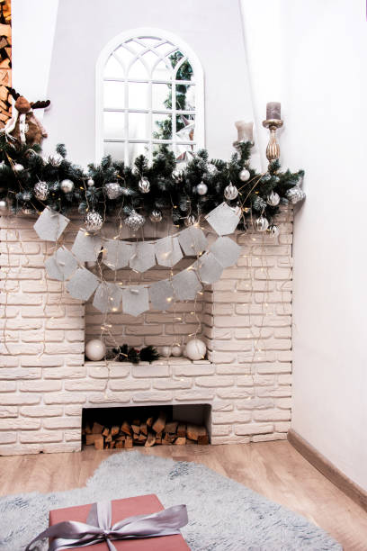 istock Ideas for New Year room decor with fireplace 1192875315