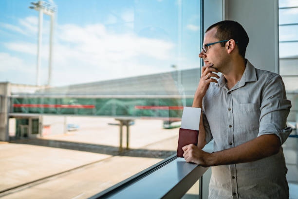 Man on airport waiting for a flight