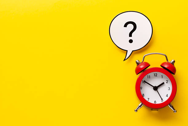 istock Colourful red alarm clock with question mark 1192875592