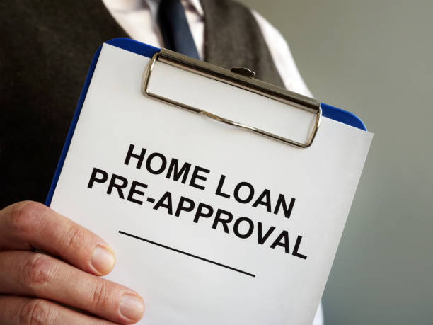 istock Home loan pre approval and mortgage documents in the hands. 1192875682