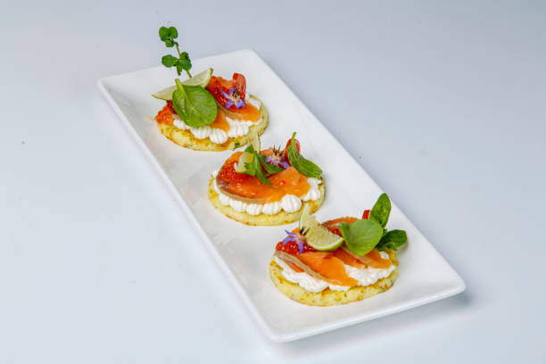 istock round sandwiches with salmon and red caviar. 1192876454