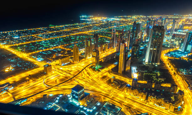istock Aerial view on Sheikh Zayed Road, Dubai Downtown at dawn 1192878431