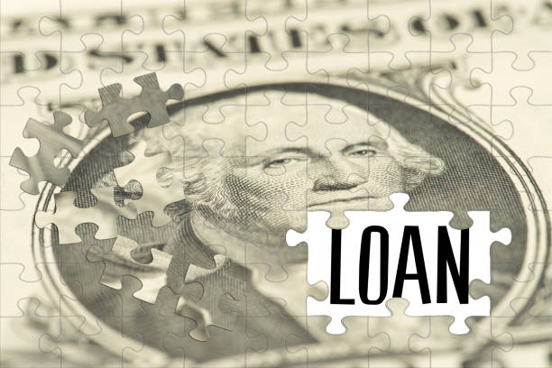 istock Puzzle of dollar banknotes and a loan 1192879779