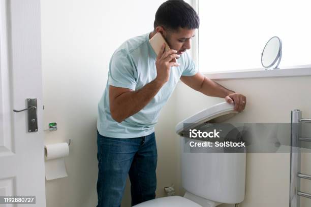 Broken Toilet Stock Photo - Download Image Now - Toilet, Plumber, Repairing