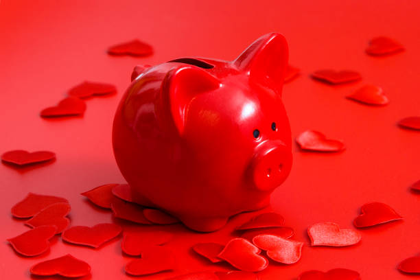 istock Red gift box with hearts on red background 1192884552