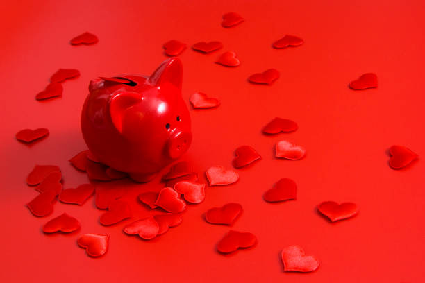 istock Red gift box with hearts on red background 1192884851