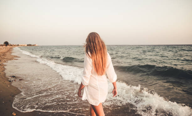 istock Woman on the beach 1192885057