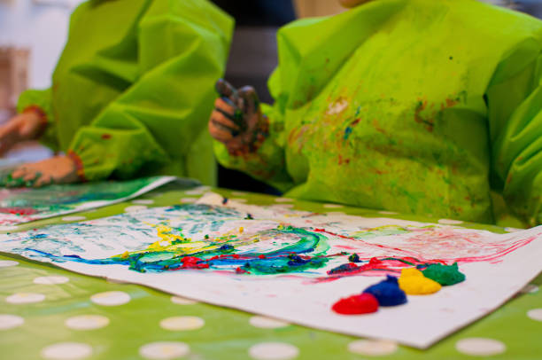 istock finger painting at a preschool 1192888172