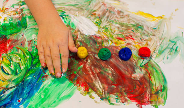 istock finger painting at a preschool 1192888175