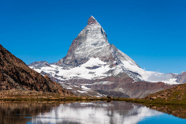 istock Riffelsee lake and Matterhorn, Switzerland 1192888937