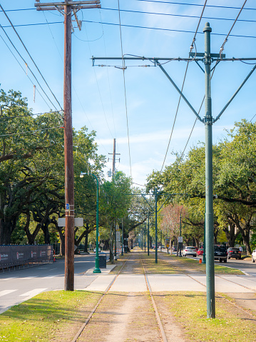 New Orleans, LA, USA. December, 2019. A vertical photo looking down St Charles Avenue in the Central Business District of New Orleans, LA.