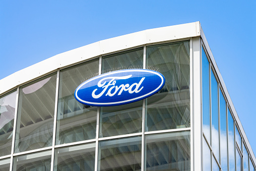 Frankfurt, Hesse/Germany - November 01, 2019: Ford logo on the glass facade of a car dealership