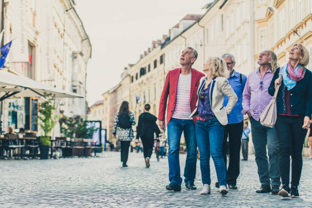 istock Senior friends exploring the city 1192891815