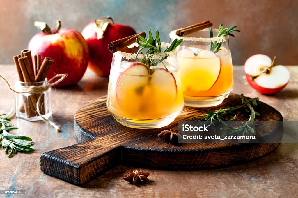 Smoky apple cider margarita fall cocktail with cinnamon, rosemary and star anise Cocktail Stock Photo