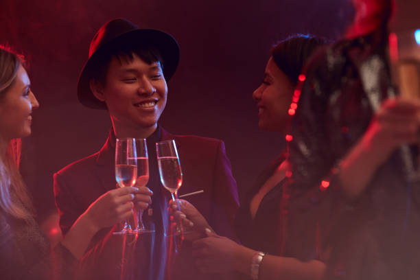 istock Young People Drinking Champagne at Party 1192896064