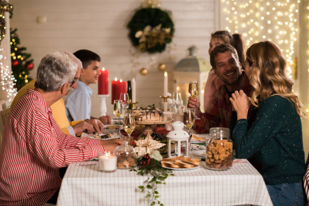 istock Christmas dinner in family environment 1192896397
